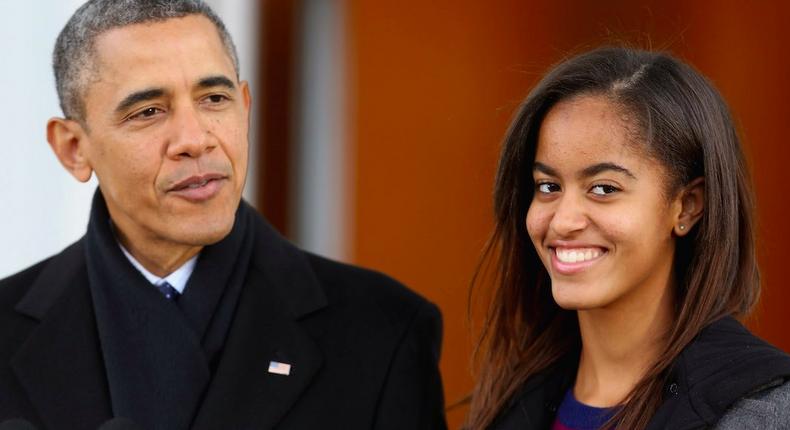 Barack and daughter Malia Obama during the 2013 pardoning of a turkey.