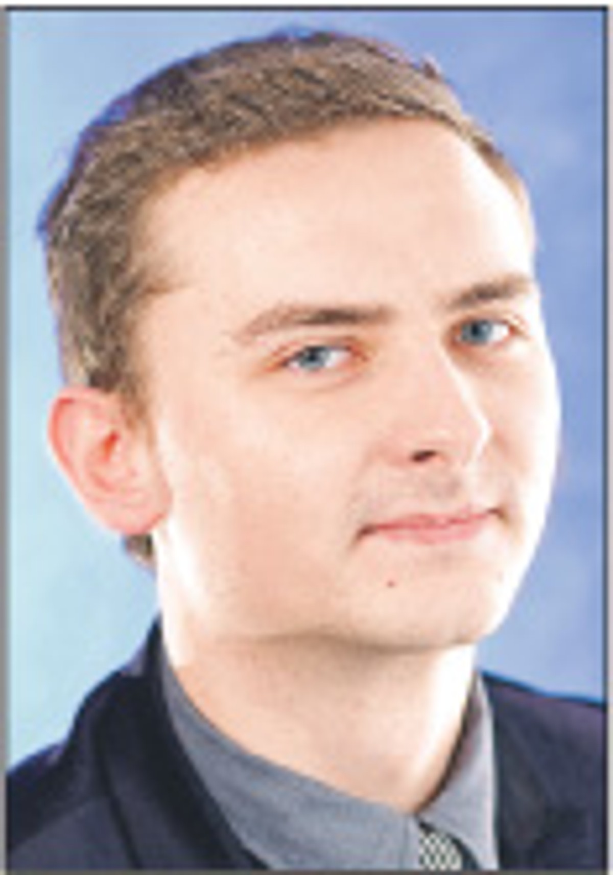 Łukasz Guza, dziennikarz działu praca