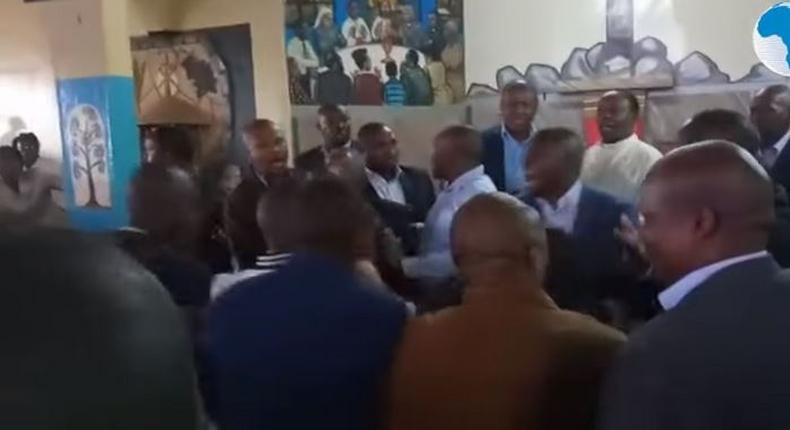 A screen-grab image of the drama as Ndindi Nyoro and Maina Kamanda fought in church, paralyzing service [Video]