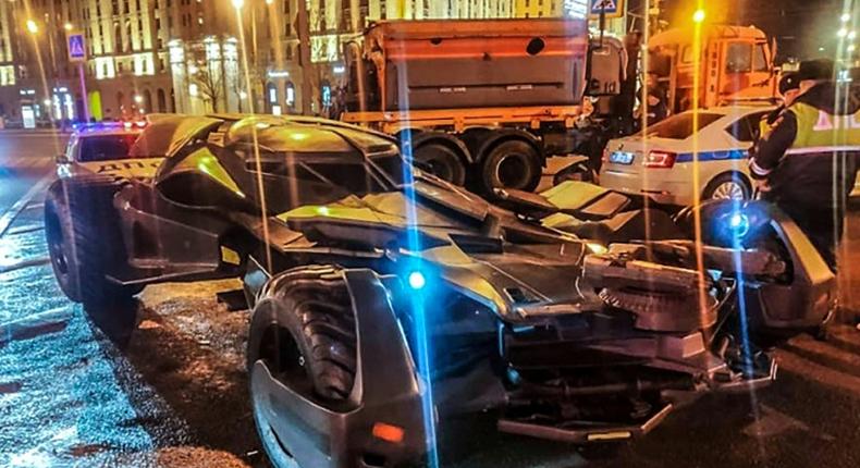 This handout photo from Russian Interior Ministry taken on February 22, 2020 shows Russian traffic policemen standing next to a vehicle in Moscow that bears a striking resemblance to the Batmobile