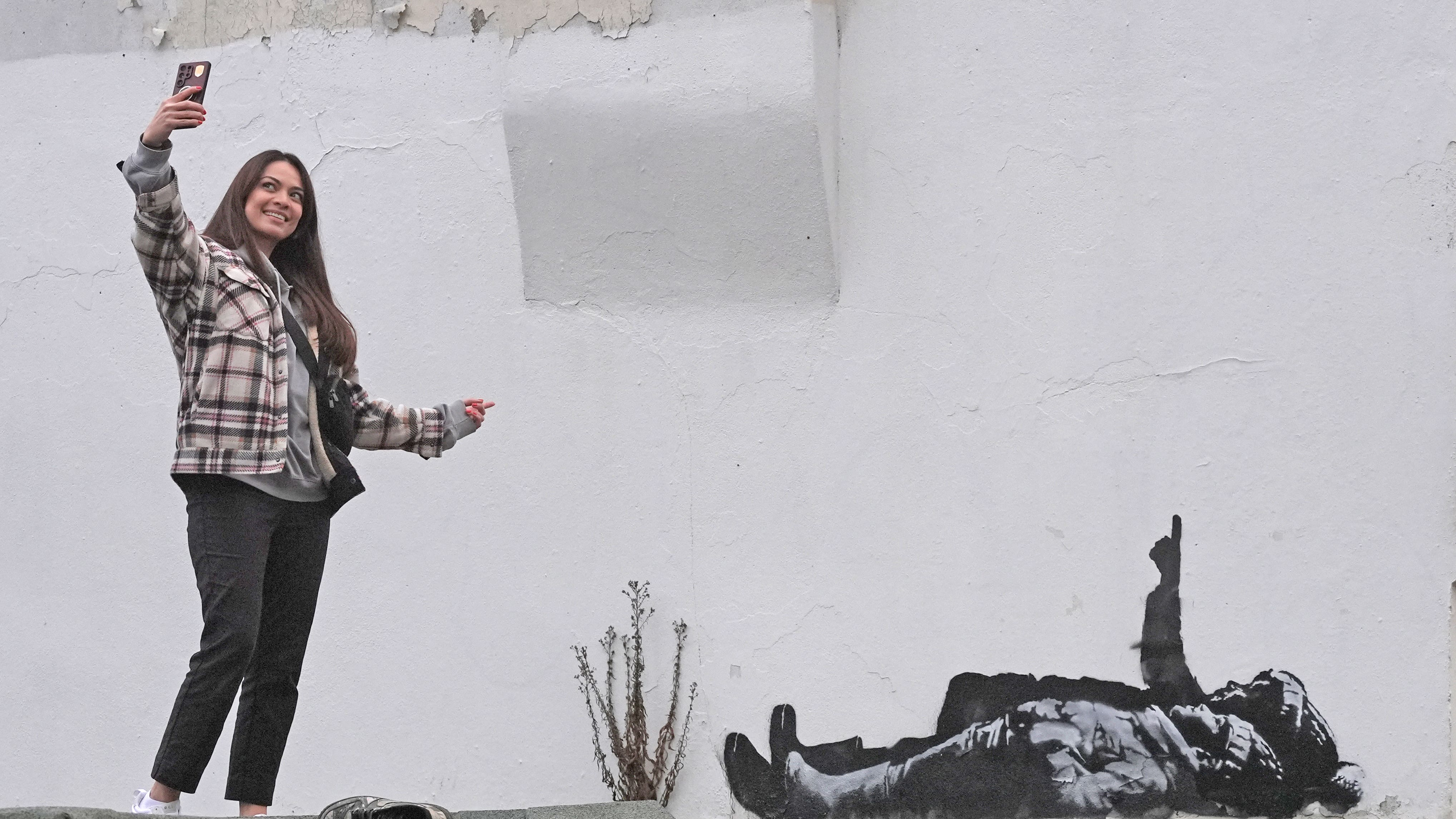 Days before Christmas: Banksy unveils mural on homeless children