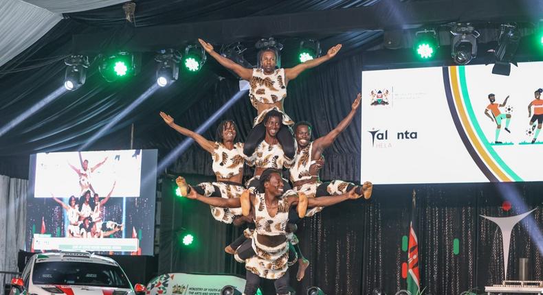 Acrobats doing stunts during the Talanta Hela launch at State House