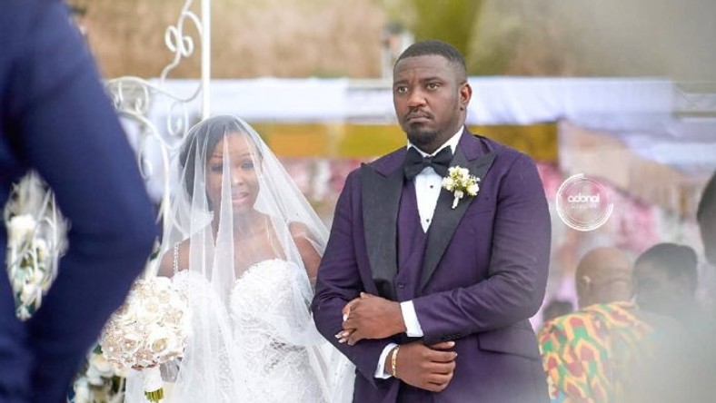 John Dumelo and wife