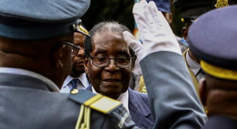 Zimbabwe President Robert Mugabe arrives to deliver the state-of-the nation address in Harare, on December 6, 2016