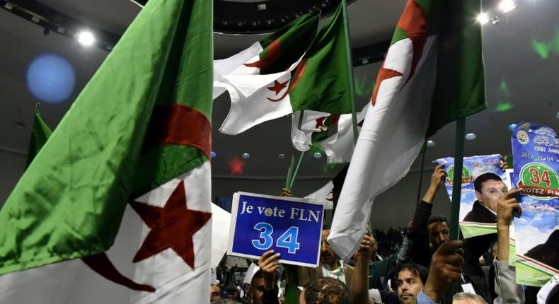 Members of Algeria's National Liberation Front (FLN) gather at a party conference in Algiers on April 28, 2017, while campaigning for May 4 elections. Media reports suggest however that Algerians are more interested in the French presidential election