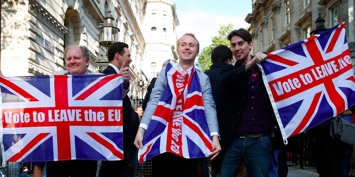 Vote leave supporters wave Union flags, following the result of the EU referendum, outside Downing Street in London, Britain June 24, 2016.