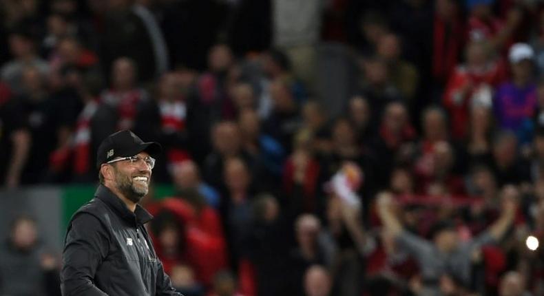 Liverpool manager Jurgen Klopp celebrates after beating Paris Saint-Germain 3-2 on Tuesday