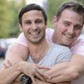 Happy gay couple outdoors