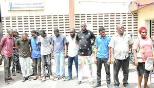 Lagos State Government officials during the arrest of fake enforcement officials in the Cele/Itire area of the state. [Twitter:@Mr_JAGs]