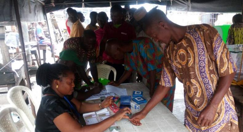 Accreditation and voting by the electorates during Lagos LG election at WARD C, Unit 008, Ilupeju.