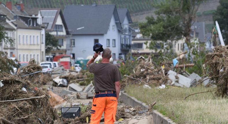 A man looks at a destroyed railway track along the river Ahr in Dernau near Bad Neuenahr-Ahrweiler, western Germany, on July 22, 2021, days after heavy rain and floods caused major damage in the Ahr region.
