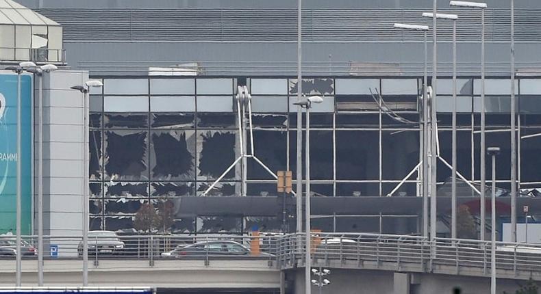 This file photo taken on March 22, 2016 shows the damaged facade of Brussels airport in Zaventem after at least 13 people were killed and 35 injured as twin blasts rocked the main terminal of Brussels airport