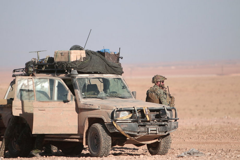 A US fighter near a military vehicle, north of Raqqa, Syria, on November 6.
