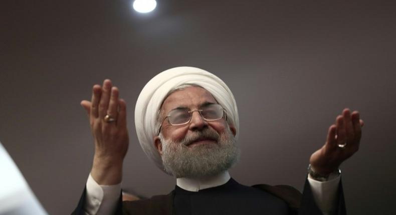 Iranian President Hassan Rouhani gestures during a campaign rally in the northwestern city of Ardabil on May 17, 2017