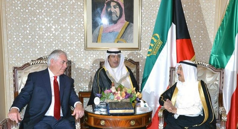 A photo provided by the Kuwaiti news agency KUNA on July 10, 2017 shows the Emir of Kuwait, Sheikh Sabah al-Ahmad al-Sabah (R), receiving US Secretary of State Rex Tillerson (L) at Bayan Palace in Kuwait City