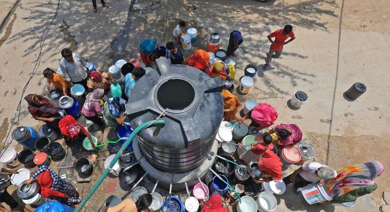 Residents collecting drinking water from a tanker due to the ongoing water crisis in India.NurPhoto/Getty Images