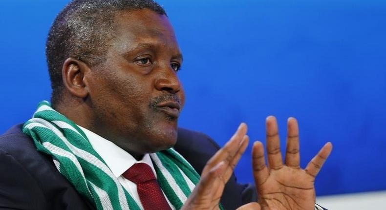 Aliko Dangote, President and Chief Executive Officer of Dangote Group and Co-Chair of the World Economic Forum (WEF) Annual Meeting 2014, speaks during a session at the WEF  in Davos January 22, 2014.  REUTERS/Denis Balibouse