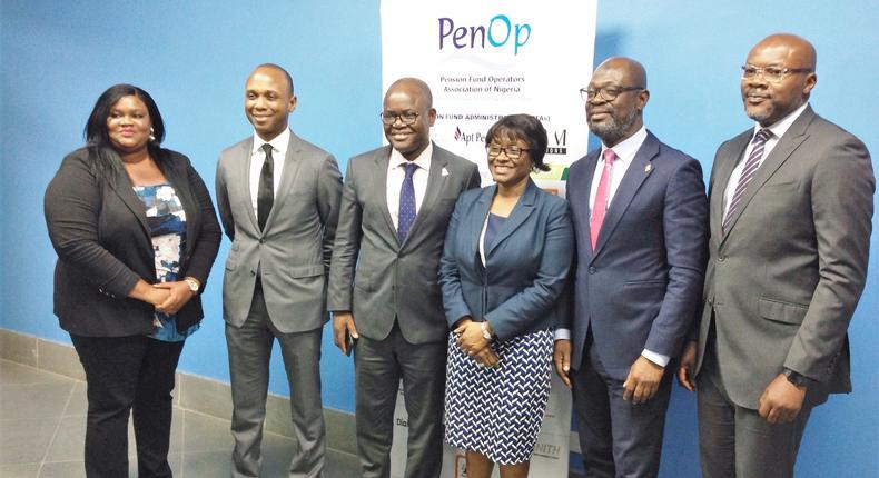 Far left: PenOp Executive Secretary Susan Oranye with members