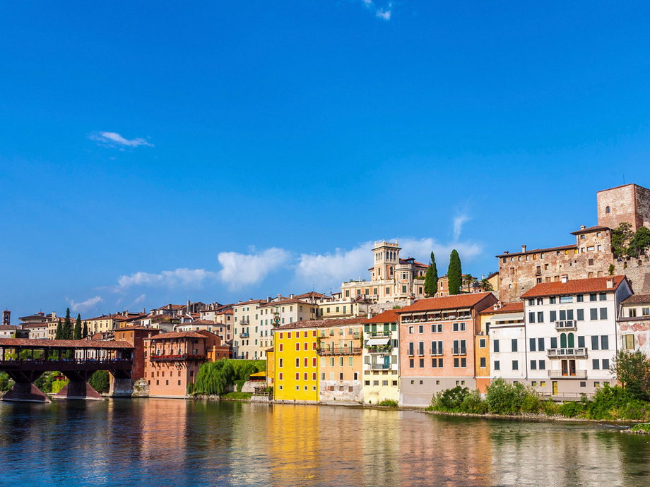The Italian town of Bassano del Grappa is known for its namesake spirit of grappa and the many distilleries where you can sample the drink. While it's often overlooked by tourists heading to Venice, the town has charming squares lined with cafes and shops and is a good home base for exploring the Veneto region.
