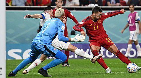 Ferran Torres scores for Spain against Costa Rica's Keylor Navas