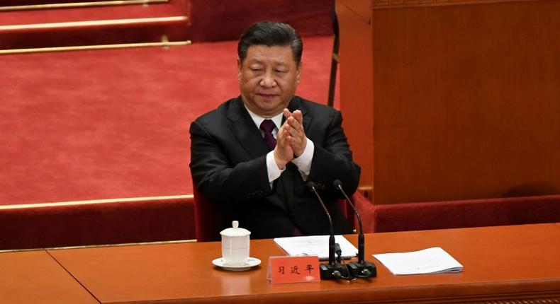 China's President Xi Jinping vowed to press ahead with economic reforms but made clear that Beijing will not deviate from its one-party system or take orders from any other country