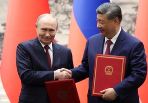 Vladimir Putin i Si Đinping tokom ceremonije potpisivanja dokumenata u Pekingu 20. maja