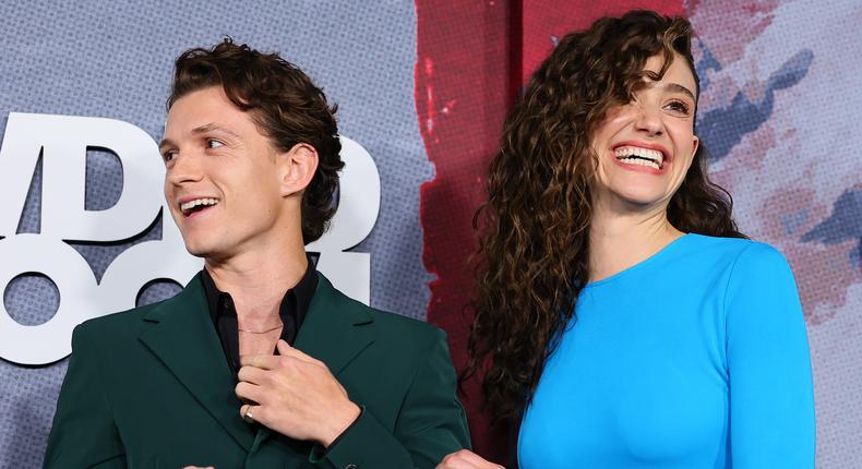 Emmy Rossum and Tom Holland, pictured here at the premiere of The Crowded Room, play mother and son in the new Apple TV+ series.Theo Wargo/GA/The Hollywood Reporter via Getty Images