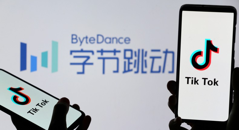 FILE PHOTO: Tik Tok logos are seen on smartphones in front of displayed ByteDance logo in this illustration