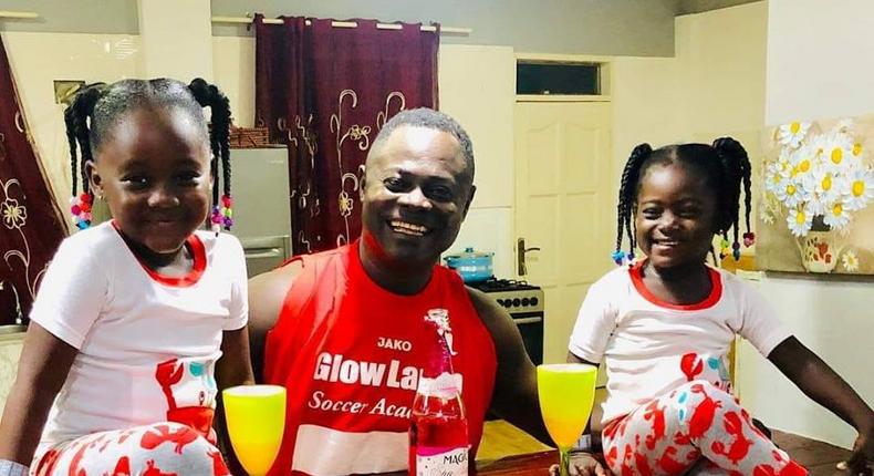 Odartey Lamptey with his two daughters