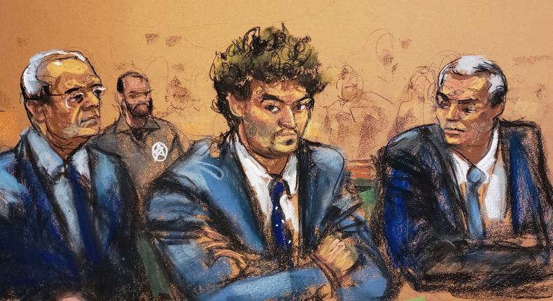 A Sam Bankman-Fried, founder and former CEO of crypto currency exchange FTX, sits after his extradition from The Bahamas with his attoneys Mark Cohen and Christian Everdell at his arraignment hearing in Manhattan federal court in New York City, U.S., December 22, 2022 in this courtroom sketch.Jane Rosenberg/Reuters