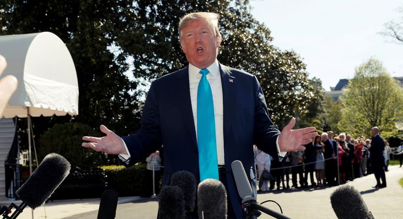 FILE PHOTO: U.S. President Donald Trump talks to reporters as he departs for travel to Texas from the White House in Washington, U.S., April 10, 2019. REUTERS/Kevin Lamarque