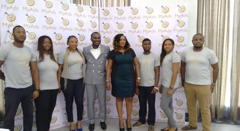 Founders of MyAds, Simeon and Madonna Onunobi, with their staff at the MyAds launch event. 