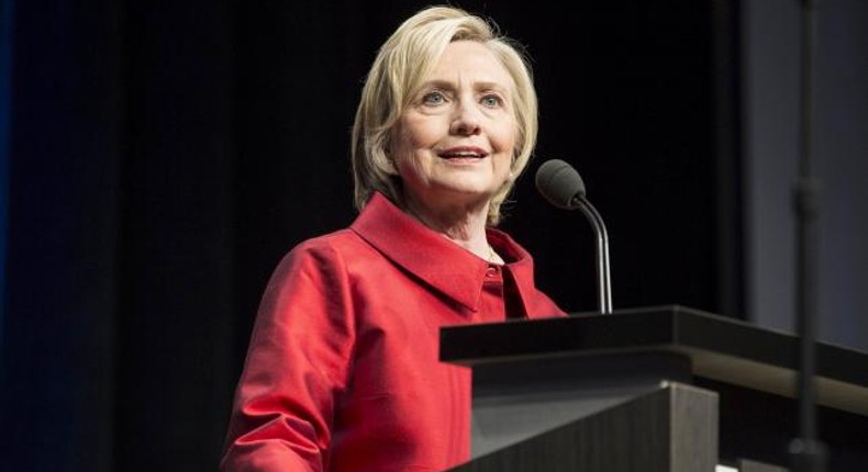 Clinton to propose tax incentives to encourage companies to share profits - aide