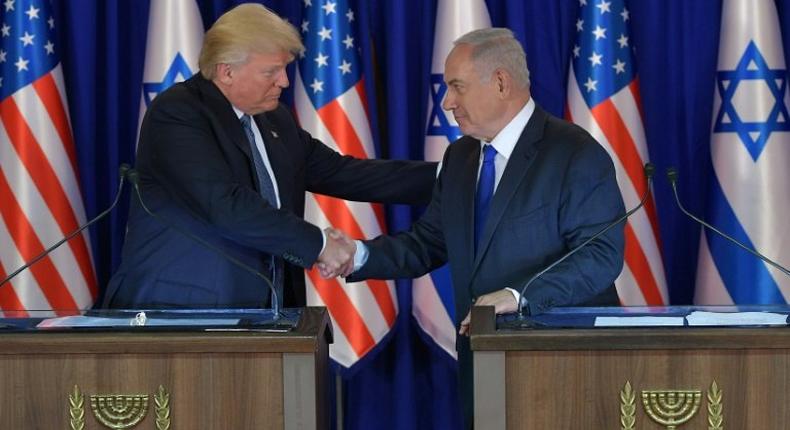 US President Donald Trump and Israel's Prime Minister Benjamin Netanyahu shake hands after speaking to reporters in Jerusalem on May 22, 2017