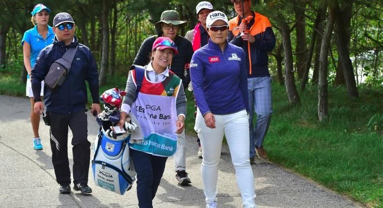 South Korea's Pak Se-Ri (R) moves to the fourth hole during the LPGA KEB Hana Bank Championship in Incheon, west of Seoul, on October 13, 2016