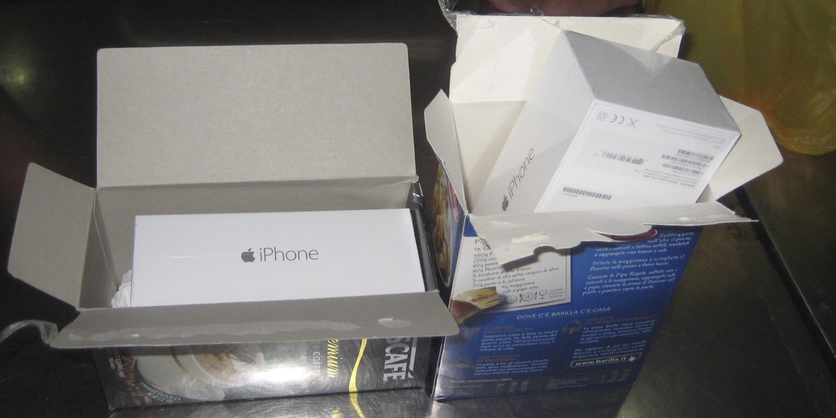 Smuggled sets of Apple iPhone 6 are displayed after being found hidden in coffee boxes, at the customs in Shenzhen, near the Hong Kong border