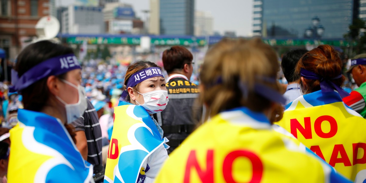 Seoungju residents take part in a protest against the government's decision on deploying a U.S. THAAD anti-missile defense unit in Seongju, in Seoul, South Korea, July 21, 2016.