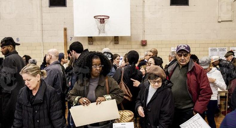 Voters prepare to cast their ballots on Election Day at Public School 163 in New York, Nov. 8, 2016. Amid a movement by liberal opponents of President-elect Donald Trump to recount votes in three states, the Obama administration concluded the results of the election were accurate, despite claims Russia might have hacked ballot votes.