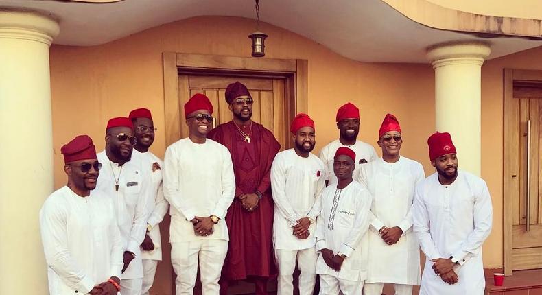 Banky W, flanked by his close friends.