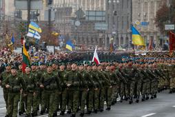Servicemen of the Lithuanian-Polish-Ukrainian brigade march during Ukraine's Independence Day milita