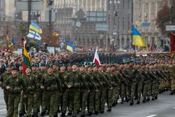 Servicemen of the Lithuanian-Polish-Ukrainian brigade march during Ukraine's Independence Day milita