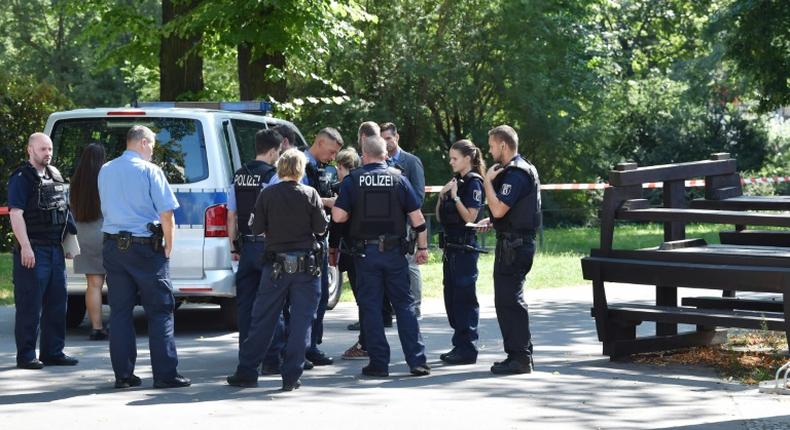 Police stand at the Berlin crime scene in August 2019 where a Georgian man who had fought against Russian forces in Chechnya was shot