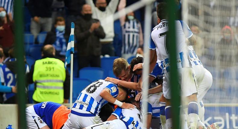 Real Sociedad's players celebrated after Julen Lobete scored his team's winner against Real Mallorca on Saturday. Creator: ANDER GILLENEA