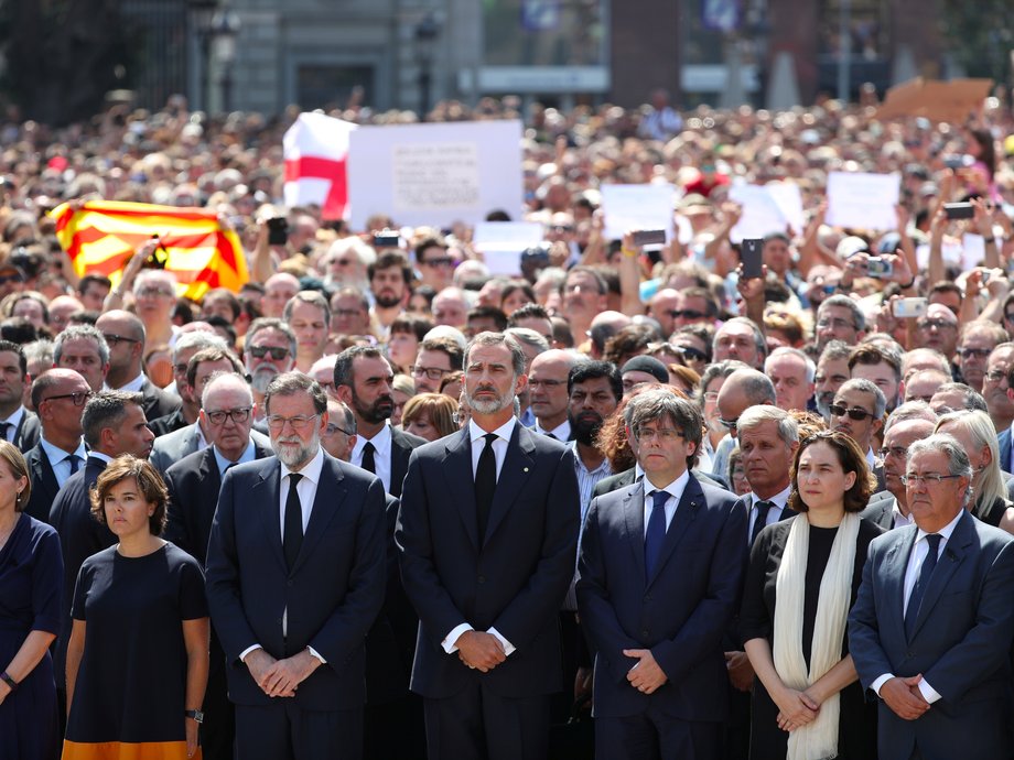 Rajoy, King Felipe VI, and Carles Puigdemont in Barcelona earlier this year.