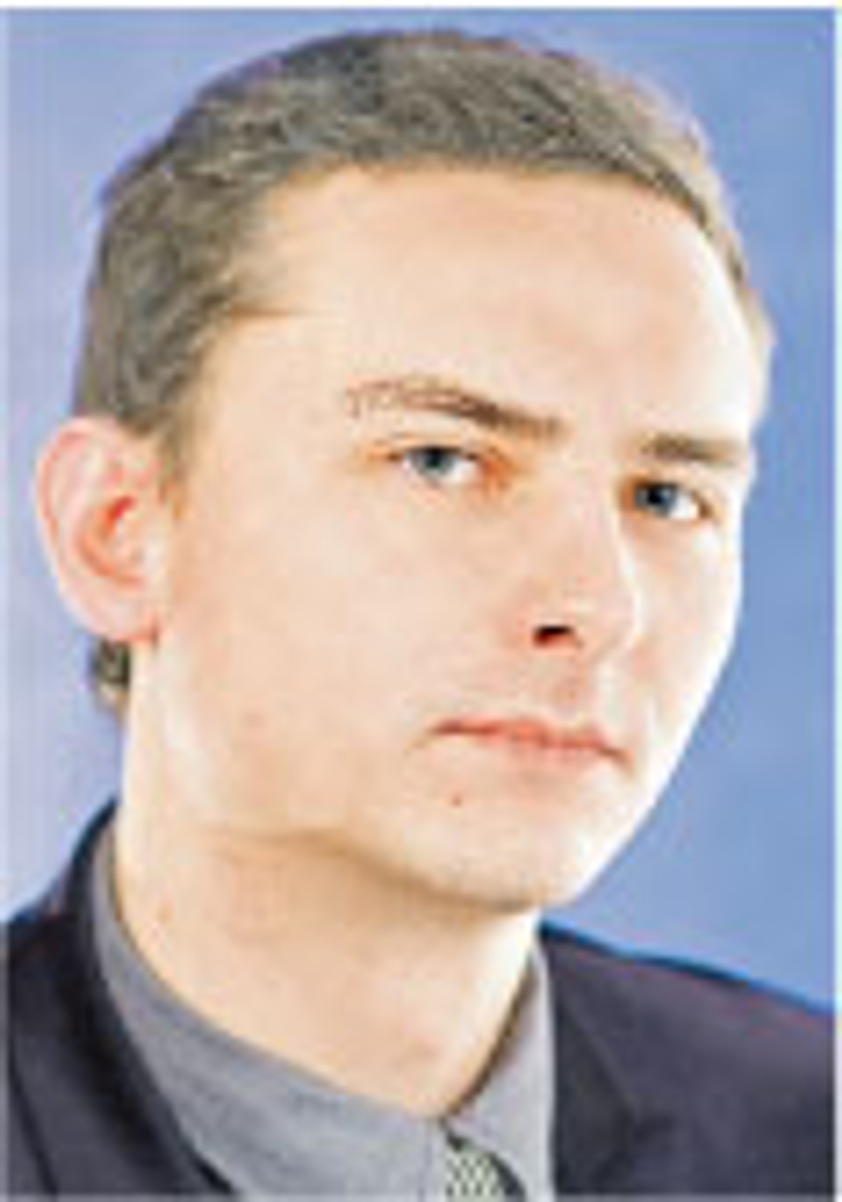 Łukasz Guza, dziennikarz działu praca
