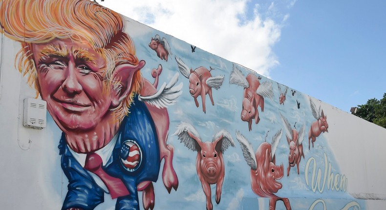 A mural titled 'When Pigs Fly' by Miami artists Rei Ramirez and Ivan Roque