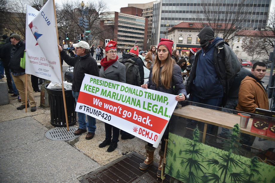 People protest Trump's stance on marijuana legalization at a rally on January 20 in Washington, DC.