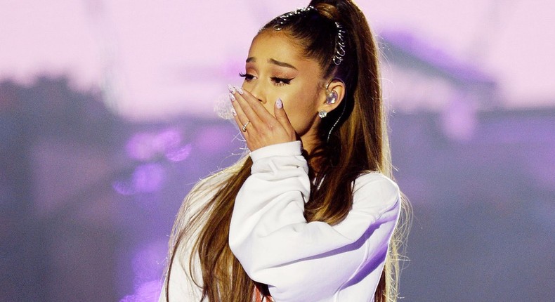 An emotional Ariana Grande performs for the crowd at the One Love Manchester Concert.