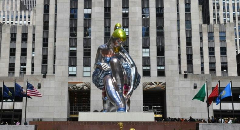 The public art exhibition of a 45-foot tall inflatable nylon sculpture depicting a seated ballerina from artist Jeff Koons' Antiquity series titled Seated Ballerina  is unveiled on May 12, 2017 at Rockefeller Center in New York