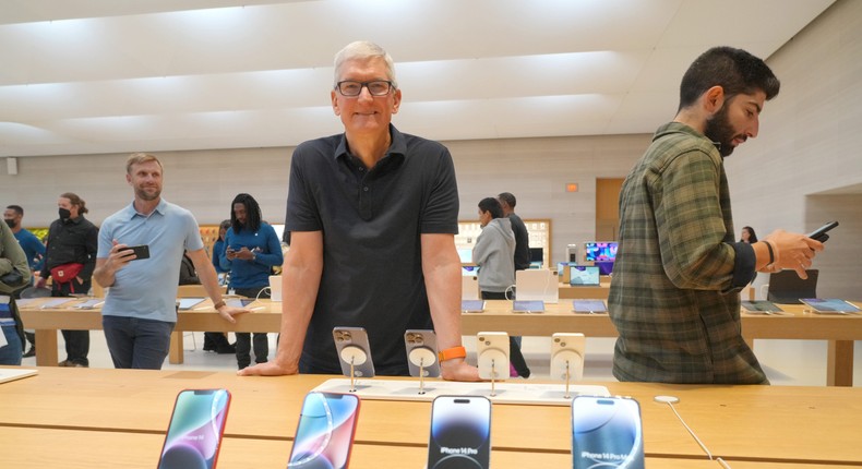 Tim Cook visits an Apple store in New York City on September 16.